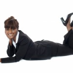 Woman in Business Suit Kicking Back