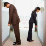 Unhappy Employees Banging Their Heads on Cubicles