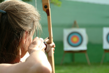 Woman Aiming at Archery Target