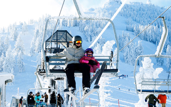 Parent and Child on Ski Lift at Mt. Ashland